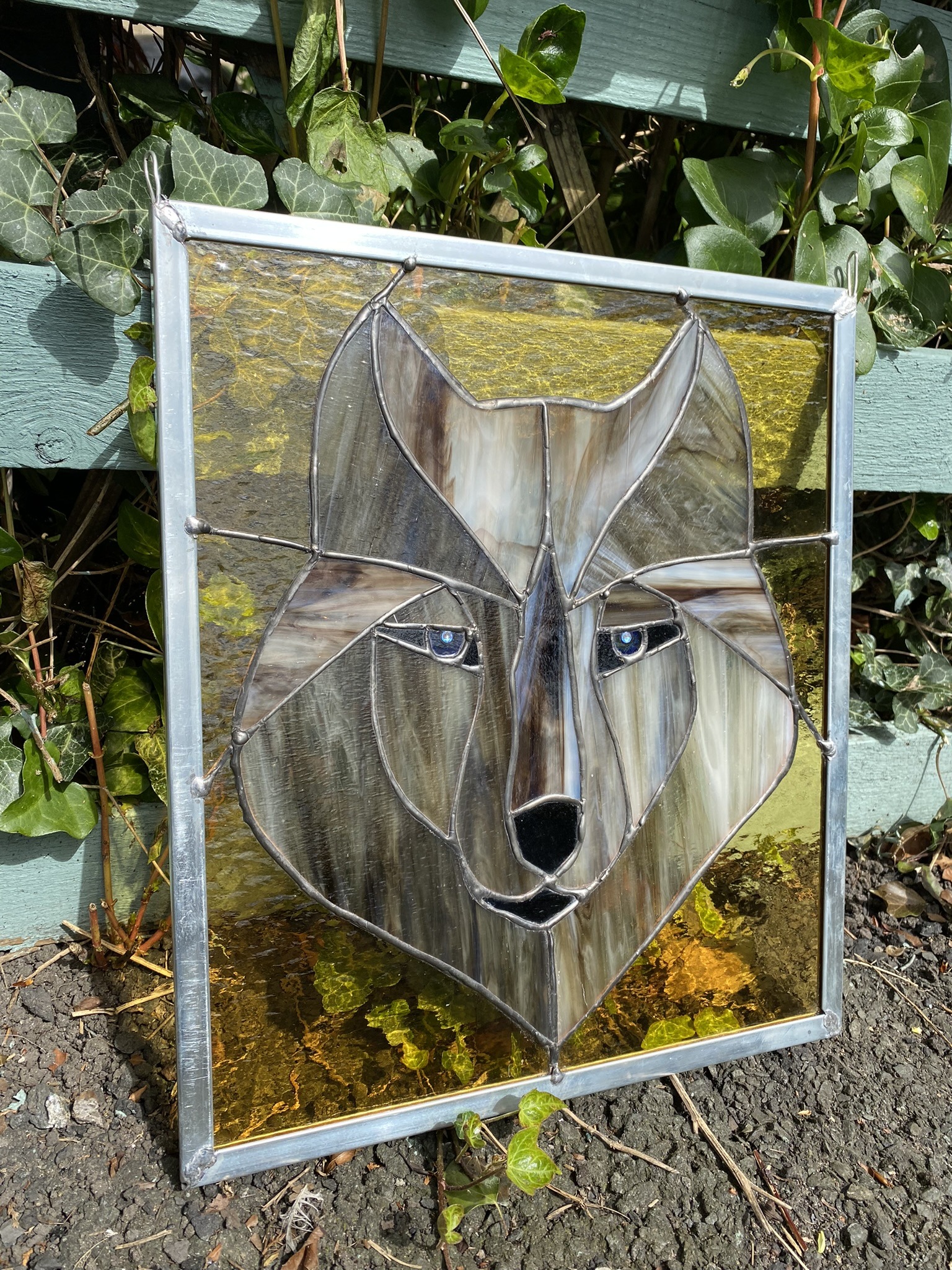 Custom stained glass art;  Zelda the wolf.